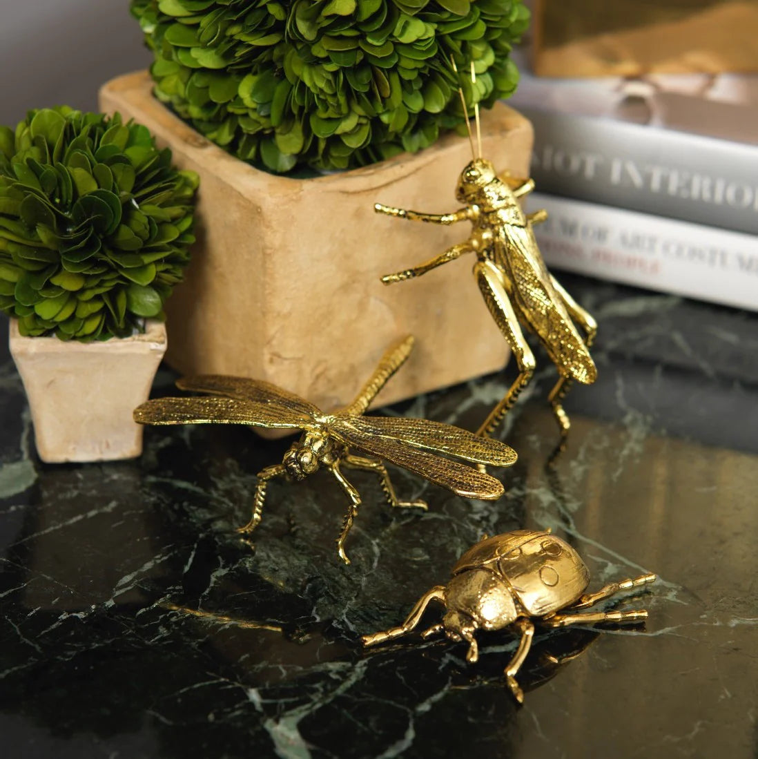 Gold ladybug decor detail