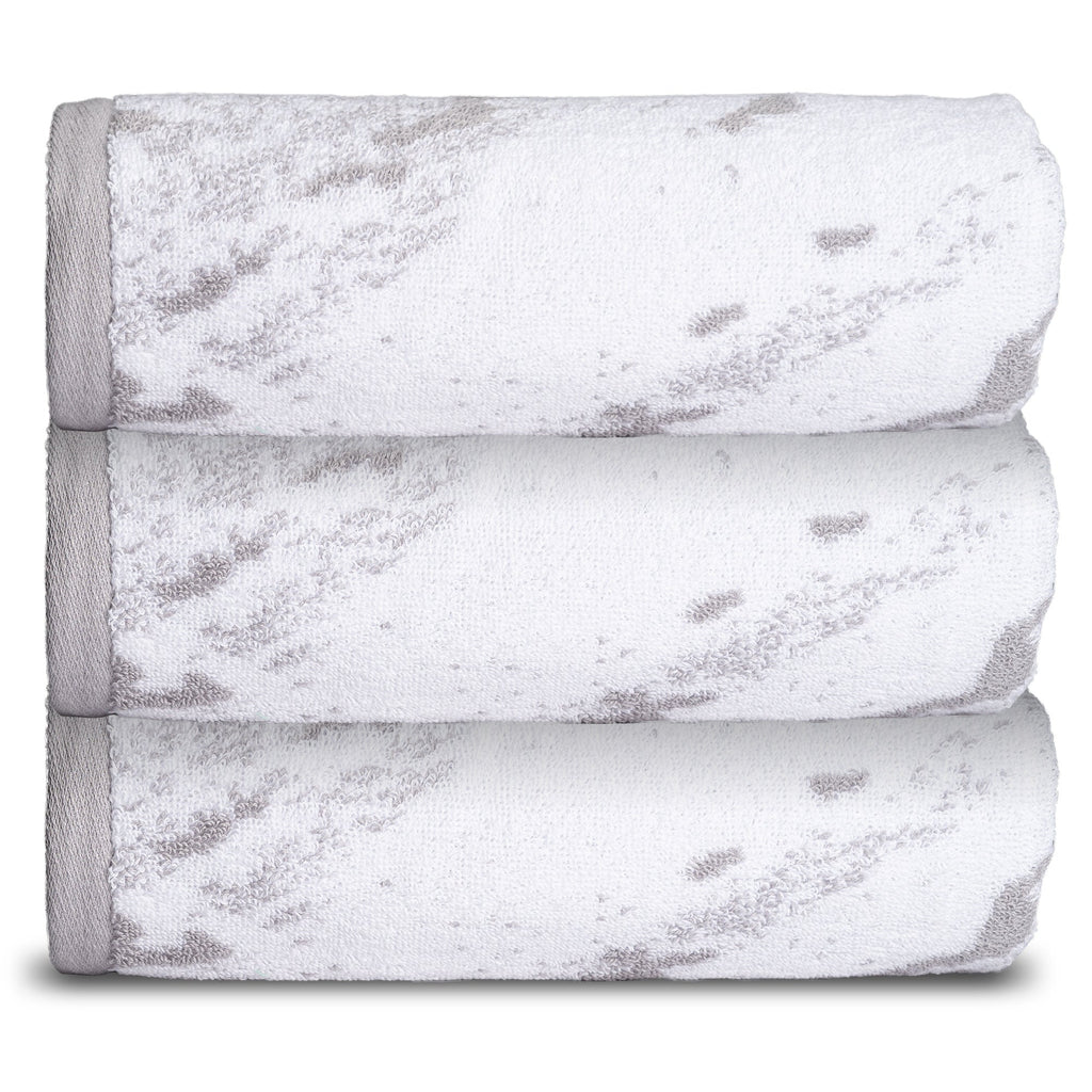 https://aurahomenj.com/cdn/shop/products/marble-gray-hand-towel-stack.jpg?v=1683642417&width=1024